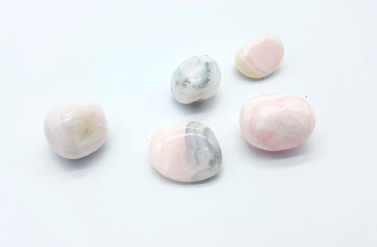 Calcite, pink mango, polished, medium