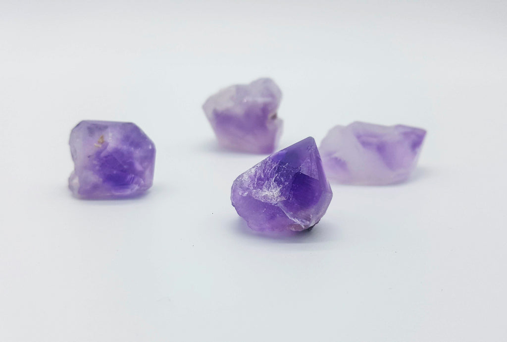 Amethyst in Raw and Tumbled Form